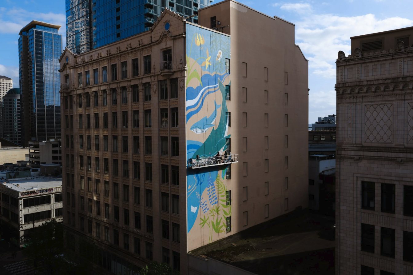 The mural on the side of the building